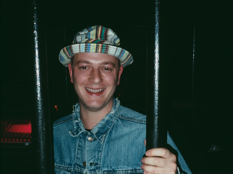 If any one fashion trend defined the 90s, and the Britpop era in particular, it was surely the bucket hat, sported here by a clubber in October 1991