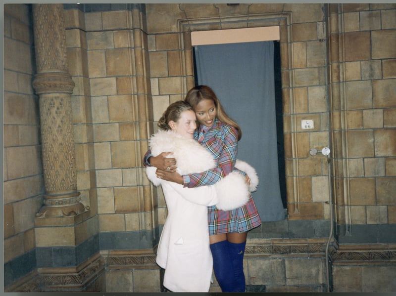 Supermodels Kate Moss and Naomi Campbell dominated 90s fashion, becoming household names. They are pictured hugging here at an event in the mid-90s.