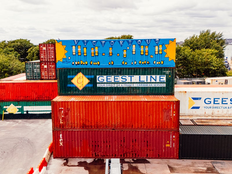 My Dog Sighs, a famous artist in Portsmouth, has teamed up with Victorious Festival to create a huge piece of artwork on a shipping container. 