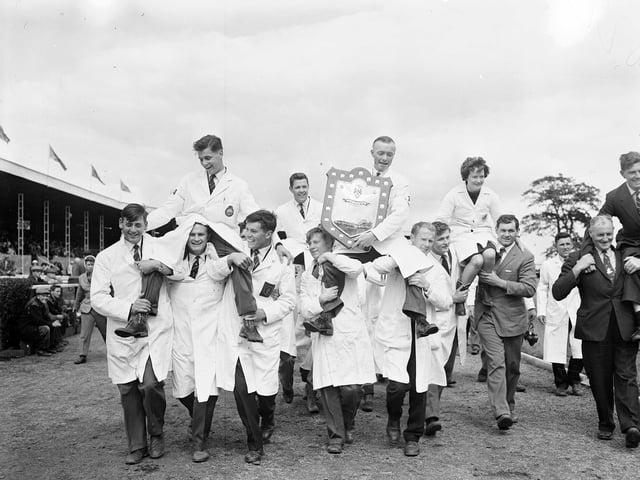 Young farmers with the Scotsman Trophy at the Royal Highland Show.