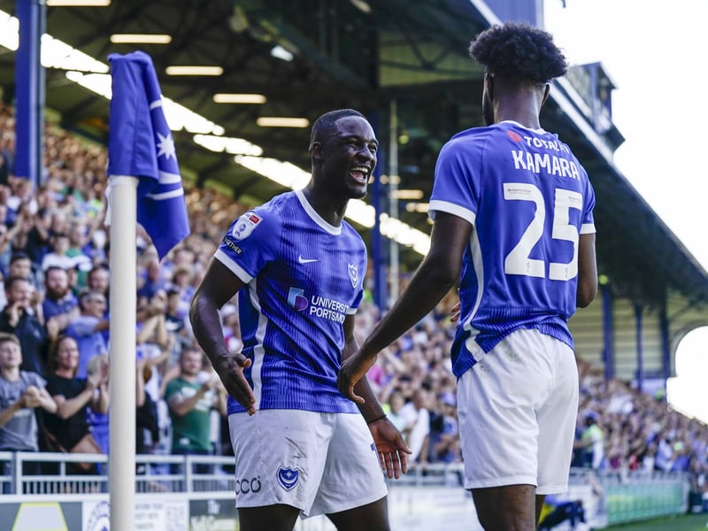 Christian Saydee celebrates Abu Kamara's goal against Peterborough in a big Fratton win in September 2023.