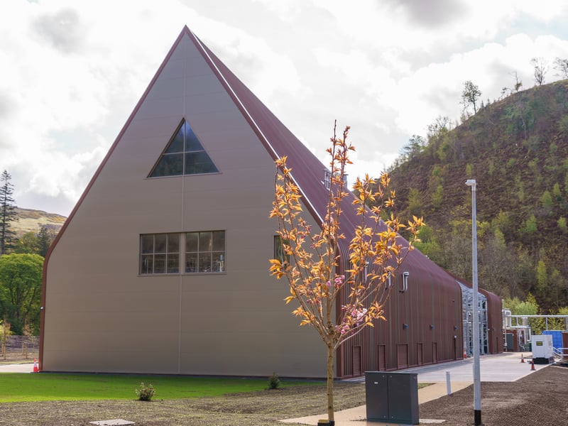The design for the Ardgowan distillery uses low environmental impact composite cladding, timber and steel materials to create a light-filled modern Nordic long hall.