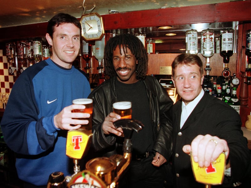 John Robertson, right, opens his new pub in Gorgie, Edinburgh, in April 1998. He's pictured with Hearts players David Weir (left) and Jimmy Boco (centre).