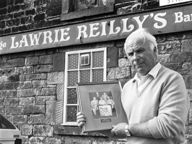 Former Hibs player Lawrie Reilly, one of the Famous Five, pictured outside his bar in 1990