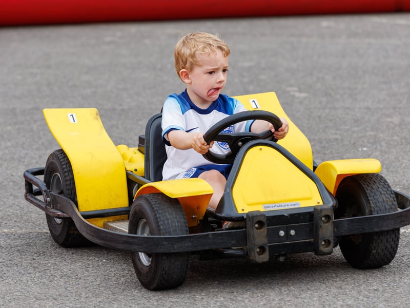 The playing field at St Thomas More's Catholic Primary School Summer Fair has been transformed this weekend for its popular summer fair. The event hosted bouncy castles, stalls, the police and special character guests. 

Pictured: Oscar Turve having fun on Go-karts

Picture:Marcin Jedrysiak