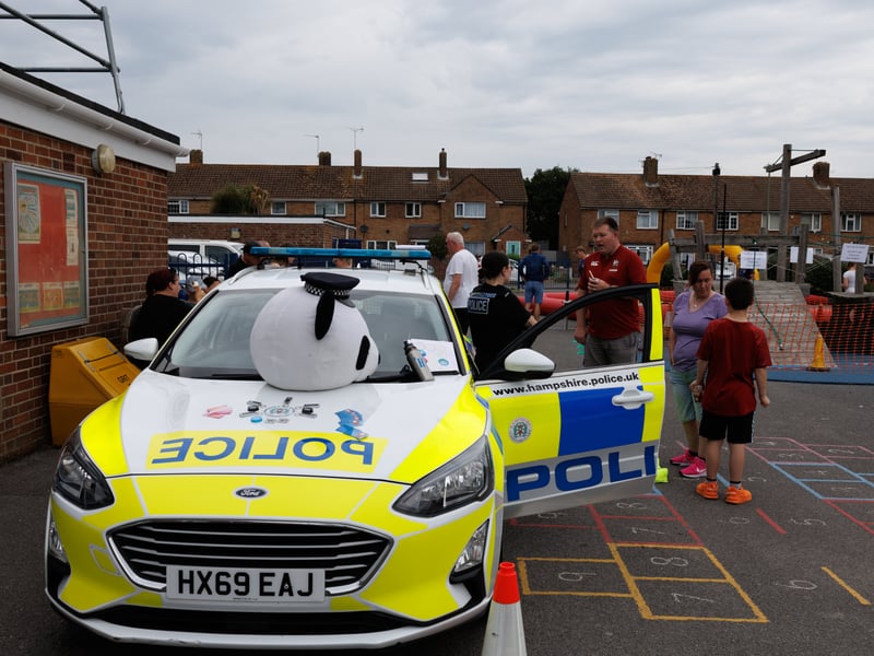 The playing field at St Thomas More's Catholic Primary School Summer Fair has been transformed this weekend for its popular summer fair. 

Pictured: Police officers at the fun day 

Picture: Marcin Jedrysiak
