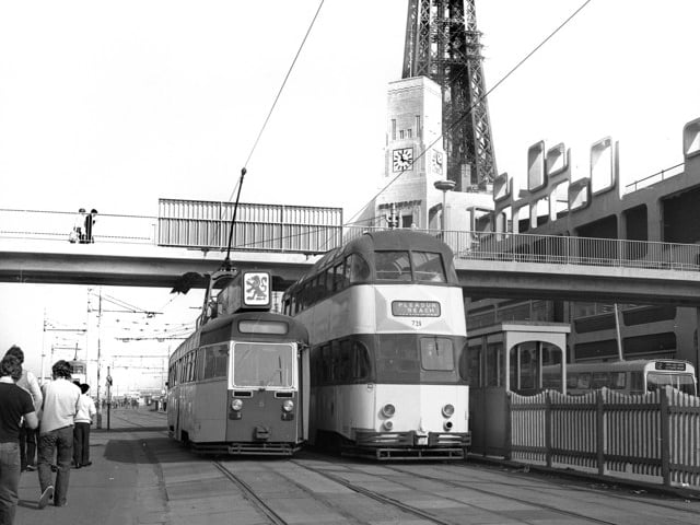 Trams under the footbridge