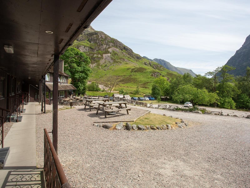 Several outdoor tables, with stunning views, are situated at the front of the Clachaig Inn. Owners Ed and Guy Daynes have described the watering hole as "more than just an inn, it’s an institution".