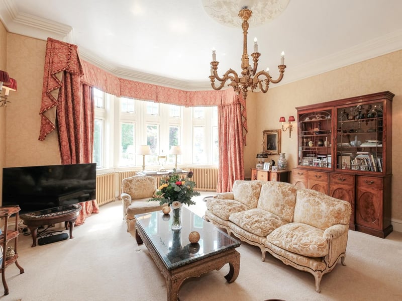 The bright upper lounge with a large bay window. 