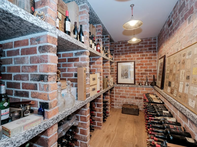 The wine cellar offers ample storage