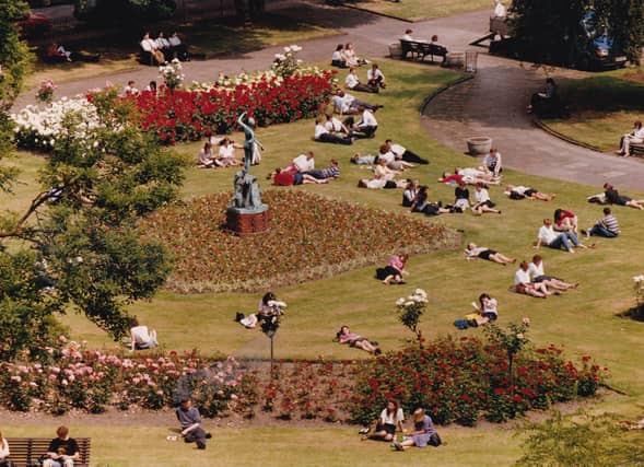 Office workers soak up the sun at Park Square in the summer of 1993.