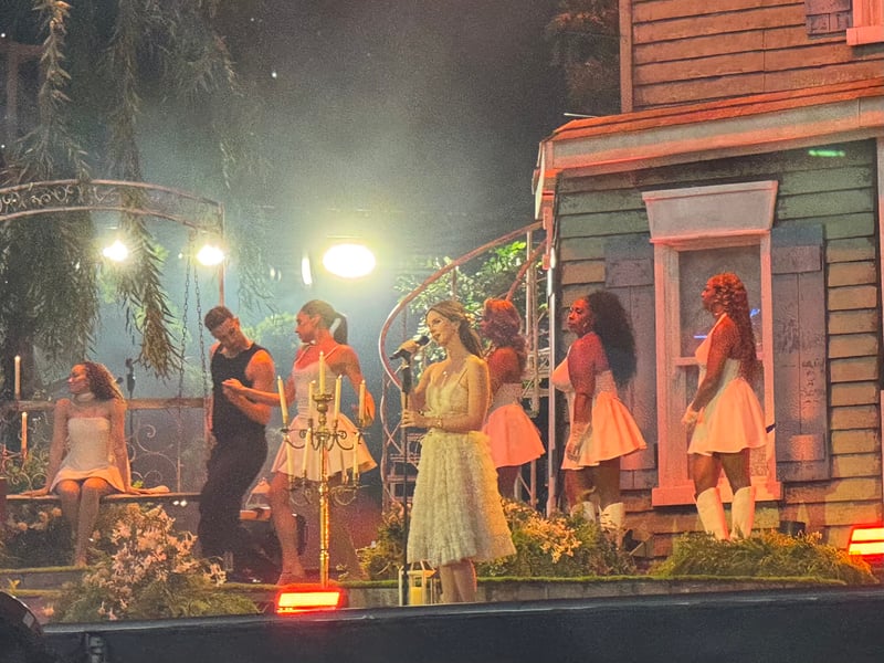 An entire house was built on stage as a backdrop.