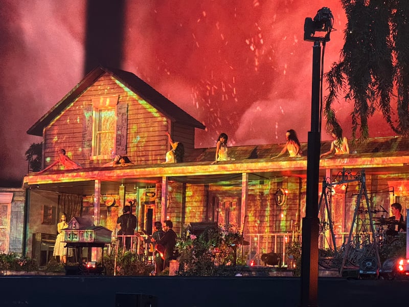 At one point in the set the house on stage appeared to burn down.