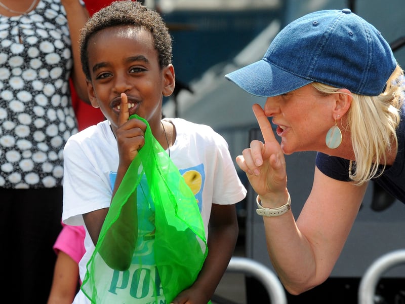 Menos Wedeslasi, seven, with Lisa Miller of Leeds Playhouse, who performed as part of the festival as Asmarina Voices.
