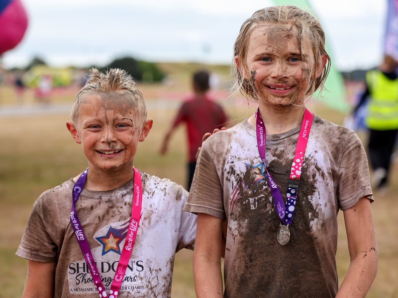 Finishers, Calum Holland, 8, and Rayah Holland, 9, right.
Picture: Chris Moorhouse (280625-035)