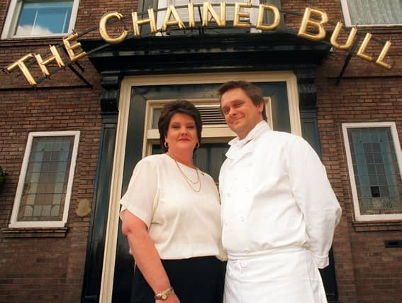 Chef Adrian Cole and bar supervisor Ann Cawley outside The Chained Bull in October 1996.