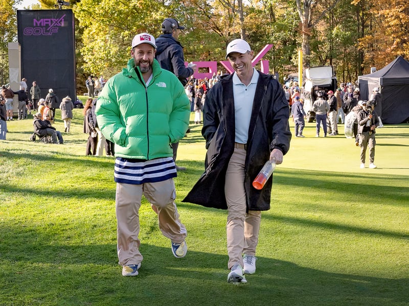 Almost 30 years on from the first film, Adam Sandler will return as the titular character in Happy Gilmore 2. Coming out on Friday, July 25, the sequel will also see the familiar faces including Julie Bowen, Ben Stiller, and Christopher McDonald returning, with some all-star cast additions including Bad Bunny, Travis Kelce, Rory McIlroy, Eric André, Margaret Qualley, Benny Safdie and more, such as Eminem, Post Malone and Sandler’s wife Jackie and daughters Sadie and Sunny. 
