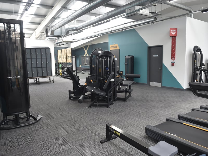 The new gym holds over a hundred pieces of state-of-the-art equipment.