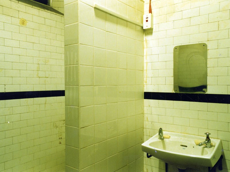 The prisoner's toilet facilities which were built between 1937 and 1941 during a programme of improvements to the Victorian prison costing a total of £8,000. Walls were tiled in white, glazed ceramic tiles for hygiene, and cell walls were also tiled.