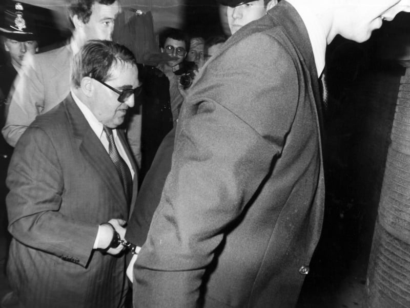 The manacled peer. Lord Kagan arrives at Leeds Bridewell in July 1980.