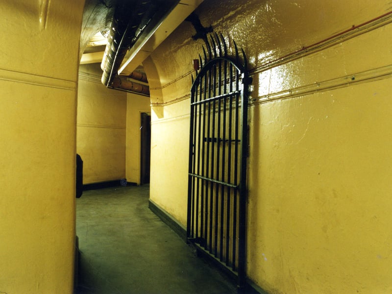 This photo shows the spiked door leading to the cells of the Leeds Bridewell. This was the 'Town Lock Up' and is officially known as the 'Central Charge Office'. Prisoners were brought here following arrest in the town. They would then make their first appearance in court.