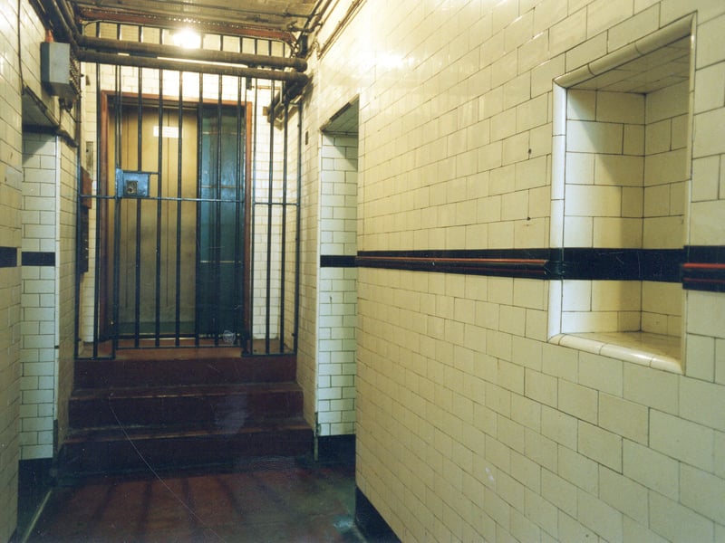 The corridor accessing cells. The Victorian prison opened in 1858 but underwent considerable modernisation in 1941 including the white tile walls seen here.