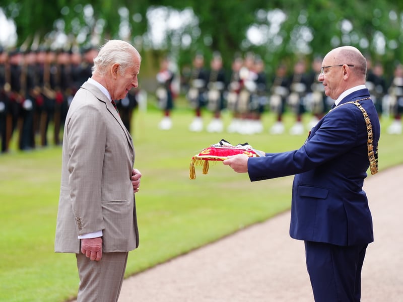 The Lord Provost of Edinburgh Robert Aldridge (right) presents the keys to the City of Edinburgh to King Charles III during the Ceremony of the Keys in the gardens of the Palace of Holyroodhouse in Edinburgh, as part of his trip to Scotland for Holyrood Week.
