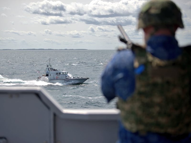 A NATO gunner prepares to fend off an attack by HMS Example