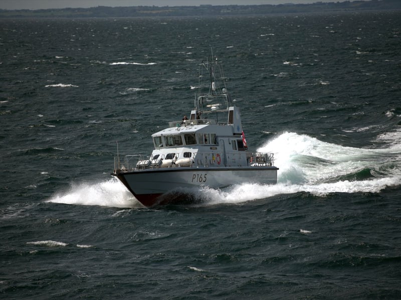 HMS Example at full throttle charges towards NATO ships testing their gunnery response