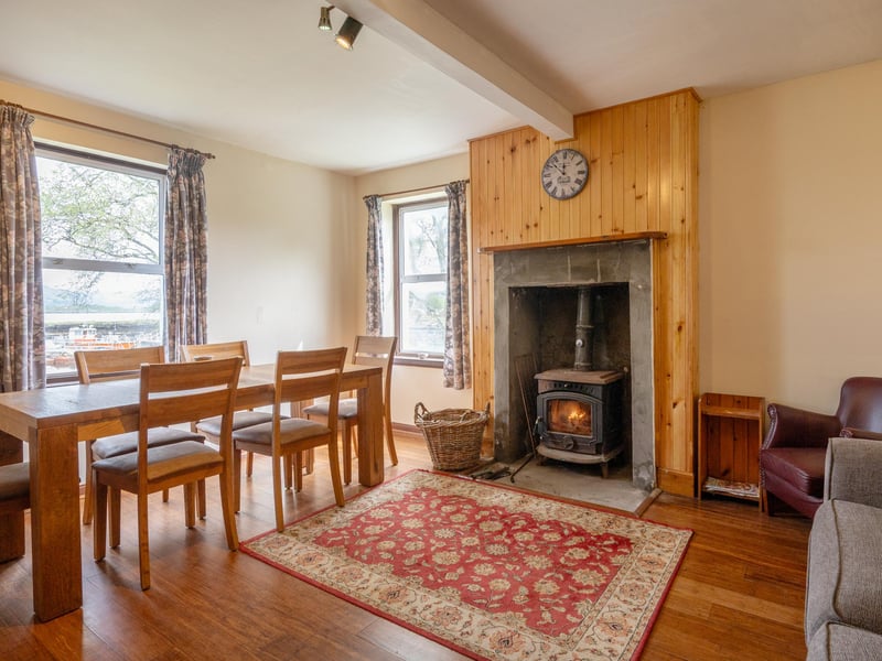 On the ground floor there is an entrance porch, hallway, twin bedroom, kitchen and sitting room with wood burning stove, while on the first floor there are two double bedrooms and a family bathroom. 
