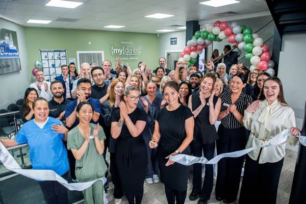 Tracy Kane, practice manager, cuts the ribbon at mydentist Albion House, Spital Hill, Sheffield.