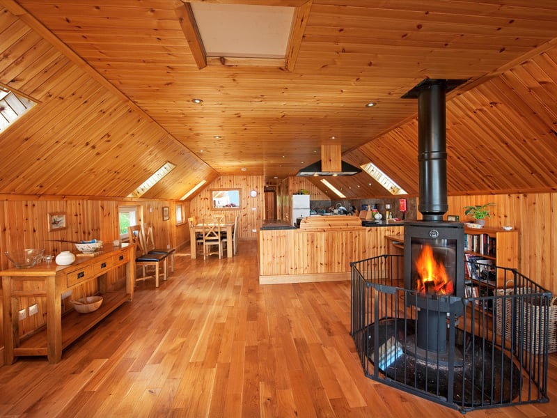 It is the hub of the Shuna’s community life with an open plan kitchen dining space and sitting area – complete with wood burning stove – and doors out to a decking area.