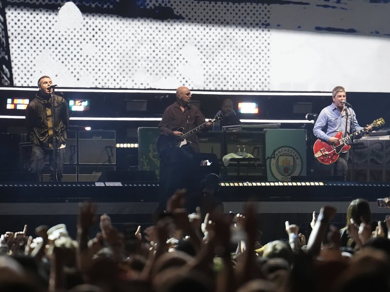 Oasis reunited on stage at the Principality Stadium, Cardiff, for the band's first gig in 16 years.