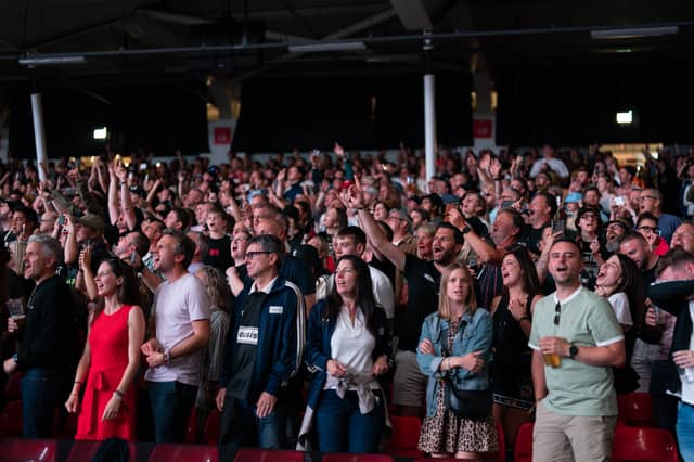 The crowd waits for Oasis to take to the stage at the Principality Stadium, Cardiff, as the band's long-awaited reunion tour kicks off in Wales.