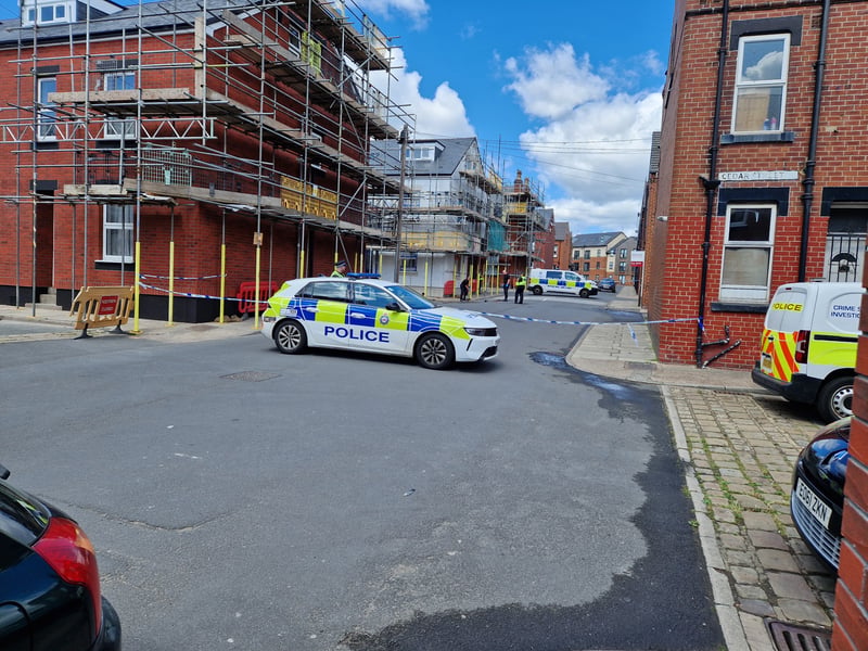 A police cordon and several vehicles blocked Colton Road and Cedar Place while forensics and detectives combed the scene for evidence.