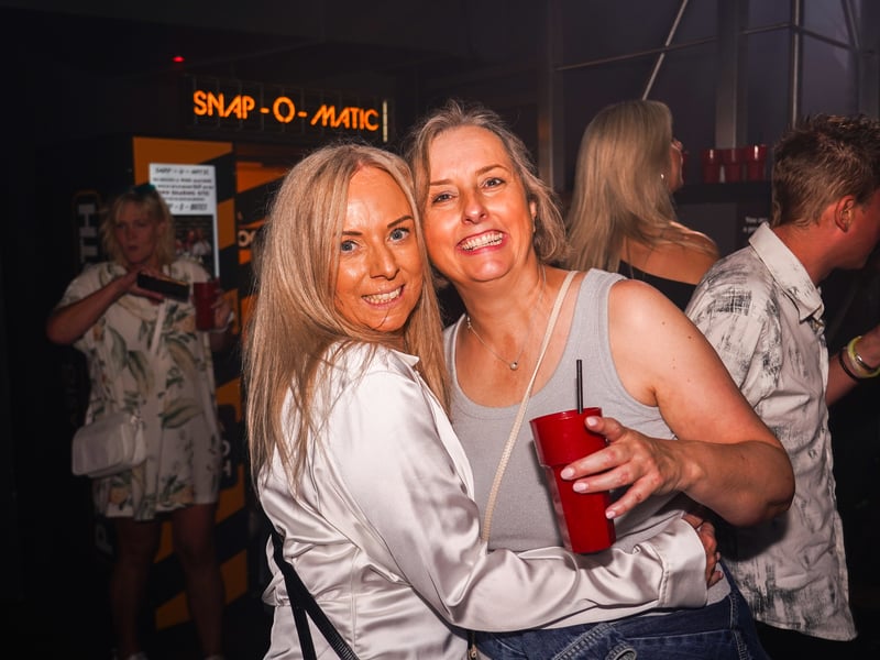 Revellers at the "truly special" reunion party at Astoria in July. A celebration of old Portsmouth nightclubs 5th Avenue, Time & Envy, Martines & Images.

Pictured: Stacey Archer (right) and Michelle Isaacs (left). 

Picture: Alec Chapman