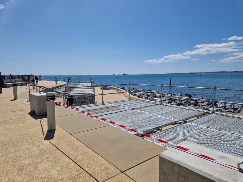 Stands along the promenade are put into place