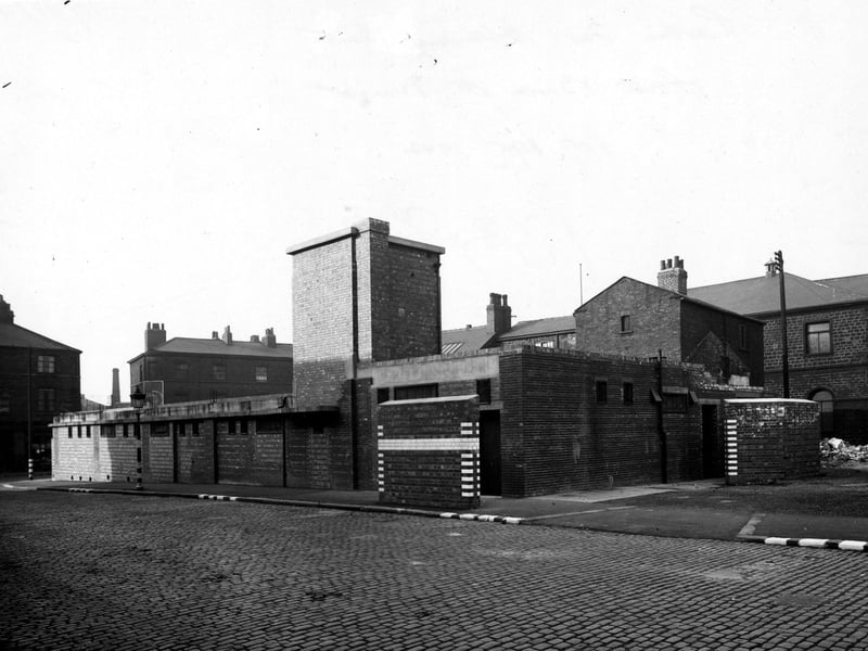A general view of the baths and washhouses on South Brook Street. The low, brick building has a taller central tower and blackout markings. Pictured in October 1942.