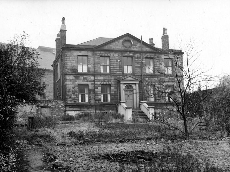 The front view of Chadwick Lodge, a stone built house with a slate roof and Georgian portico, situated at no. 24 Crown Point Road by the junction with Black Bull Street. Pictured in November 1948.