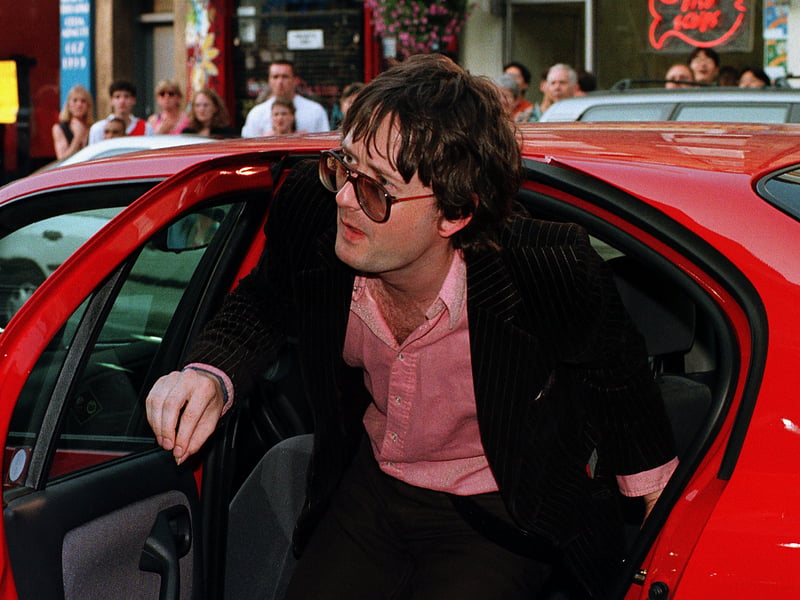 Pulp lead singer Jarvis Cocker arrives at the festival in 1997.