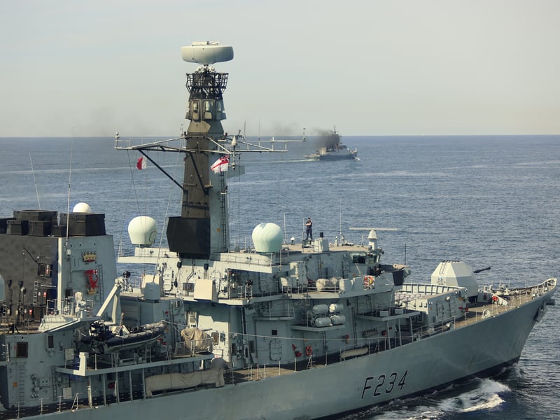 HMS Iron Duke and other Royal Navy assets were deployed from Portsmouth to stalk several Russian ships sailing in British waters. Pictured: Commanding Officer of HMS Iron Duke Commander David Armstrong atop the ship bridge roof during monitoring of RFN Boikiy
