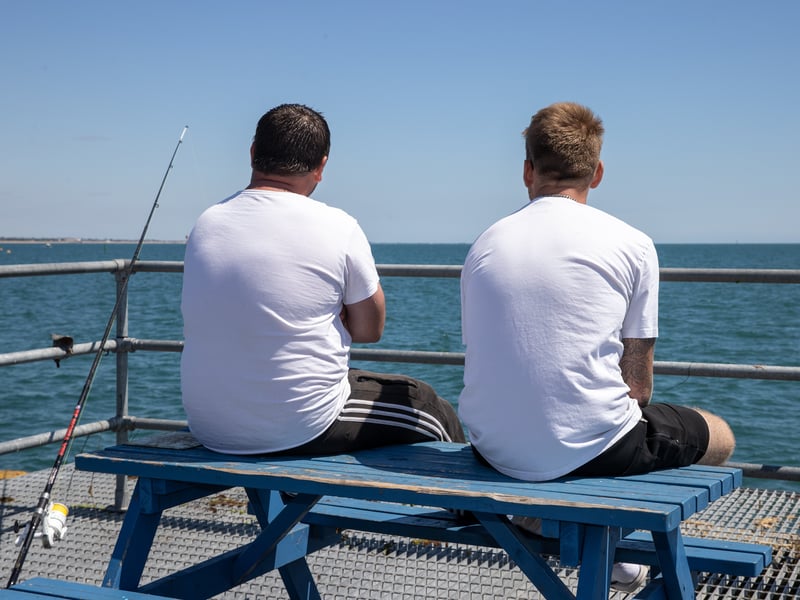 Pictured - Locals hoping for a catch on South Parade Pier
Photos by Alex Shute