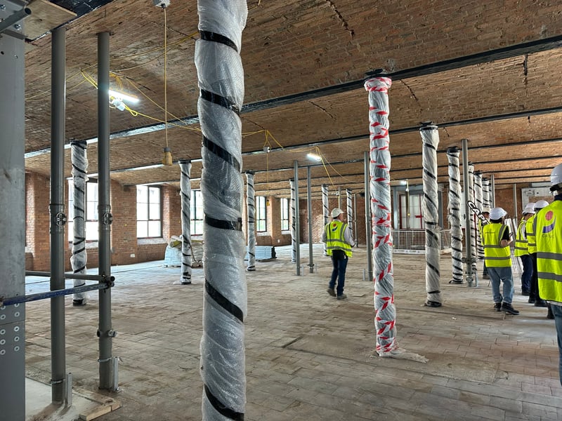 The mill has also been extended, with an extra floor built on top and a new building flanking the existing structure. 