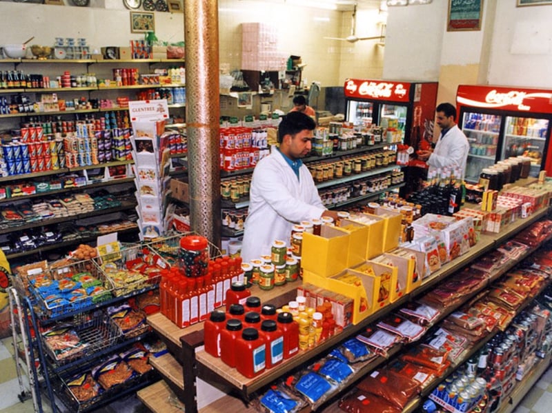 Workers at the Haji Ali Akbar shop, on Spital Hill, Burngreave, Sheffield, in 1998
