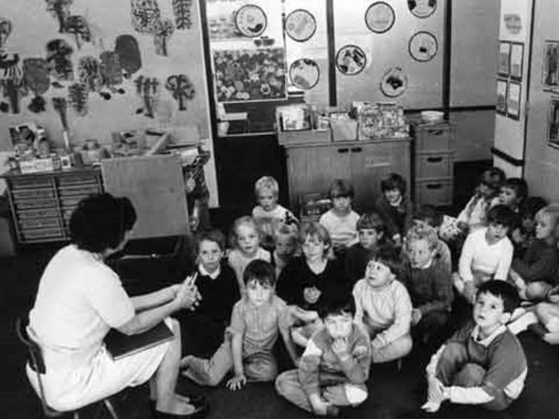 A teacher with pupils at Ecclesfield Junior and Infant School, Sheffield, in 1986