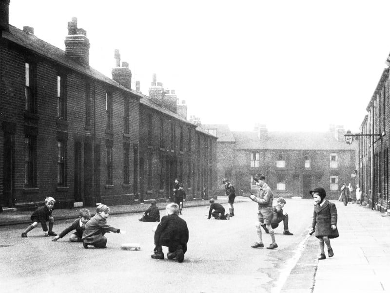 With fewer cars around in the 60s, children were often free to play out on the street, be it football, hopscotch, tag or something else. It's hard to imagine that today.