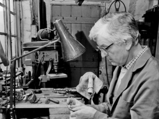 The cutler Stan Shaw, one of Sheffield's celebrated 'Little Mesters', in his Garden Street workshop in October 1993