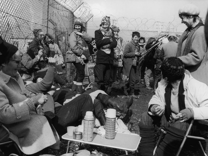 The women's peace camp at RAF Greenham Common in Berkshire, which set up to protest against the military's use of cruise missiles and to campaign for nuclear disarmament, pictured in around 1985