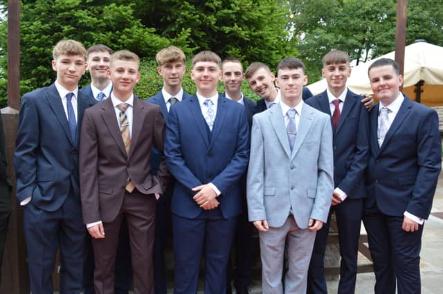 A whole gang of well dressed lads