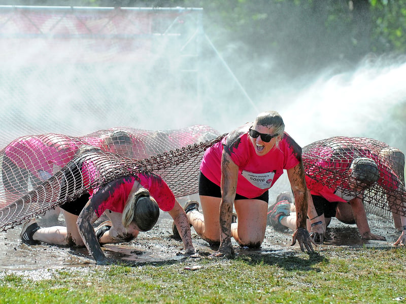 Pretty Muddy contestants getting wet and muddy.